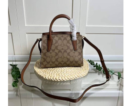 Женская брендовая небольшая сумочка Coach Andrea brown Lux